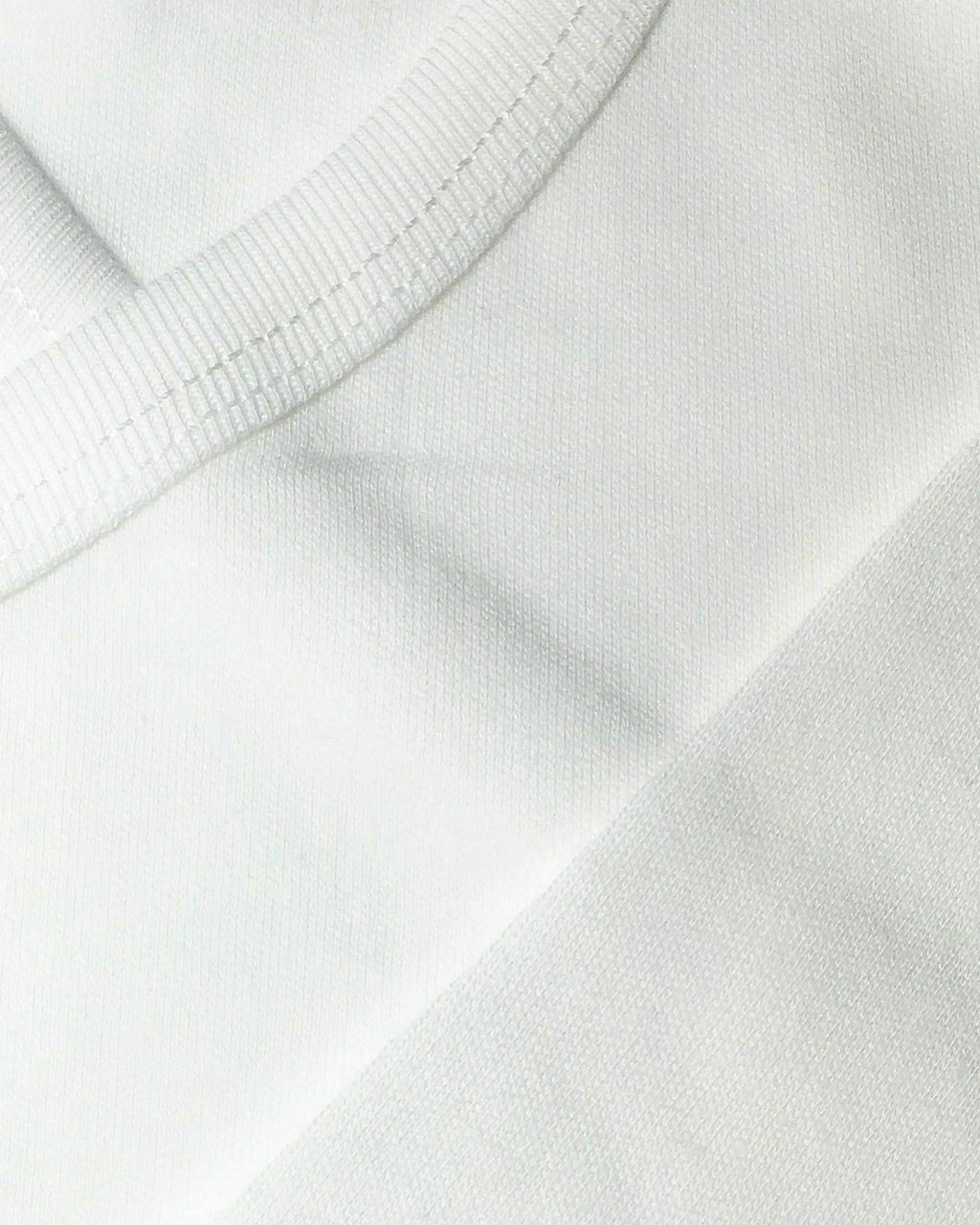 Mağazam ekru renkli, organik pamuklu yenidoğan hastane çıkışı seti kumaş dokusu detayı