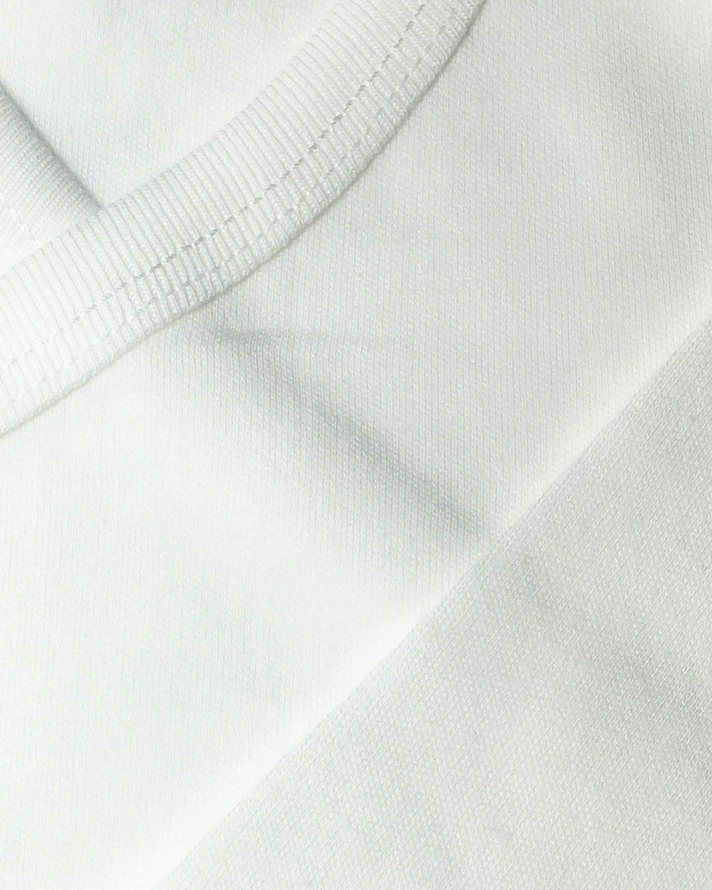 Mağazam markalı, %100 organik pamuklu, beyaz renkli, yumuşak dokulu bebek hastane çıkışı kumaş detayı
