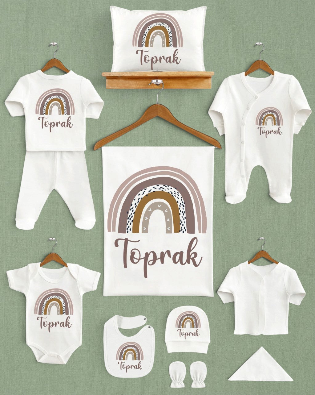 Mağazam toprak tonlarında gökkuşağı desenli, isme özel 11'li organik pamuklu yenidoğan hastane çıkışı seti.