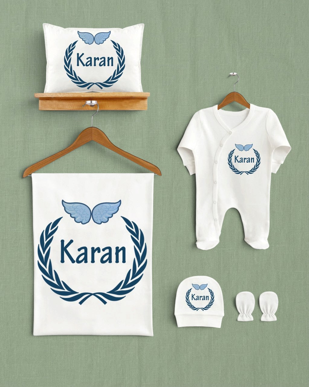 Mağazam kanatlı çelenk desenli, isim baskılı, %100 organik pamuklu 5'li beyaz bebek hastane çıkış seti